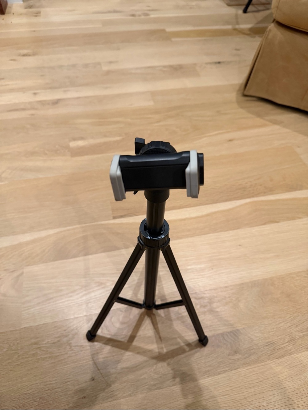 Compact Black Smartphone Tripod with Adjustable Phone Mount